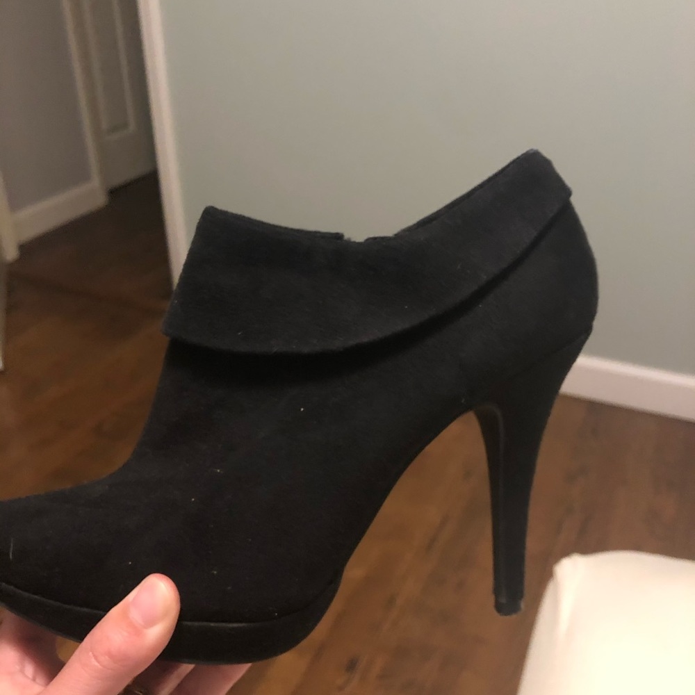 Black closed toe high heel booties